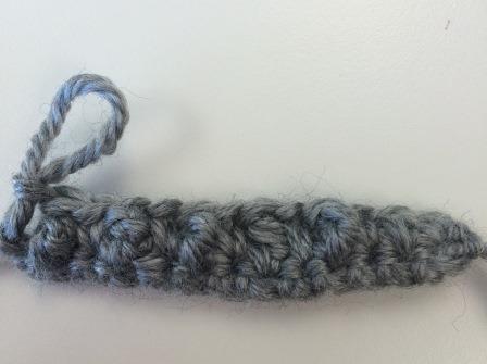 For Row 3, do a regular single crochet row. (Picture shows the wrong side, after you have done the single crochet row and turned the work.)