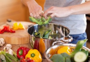 Woman preparing stew